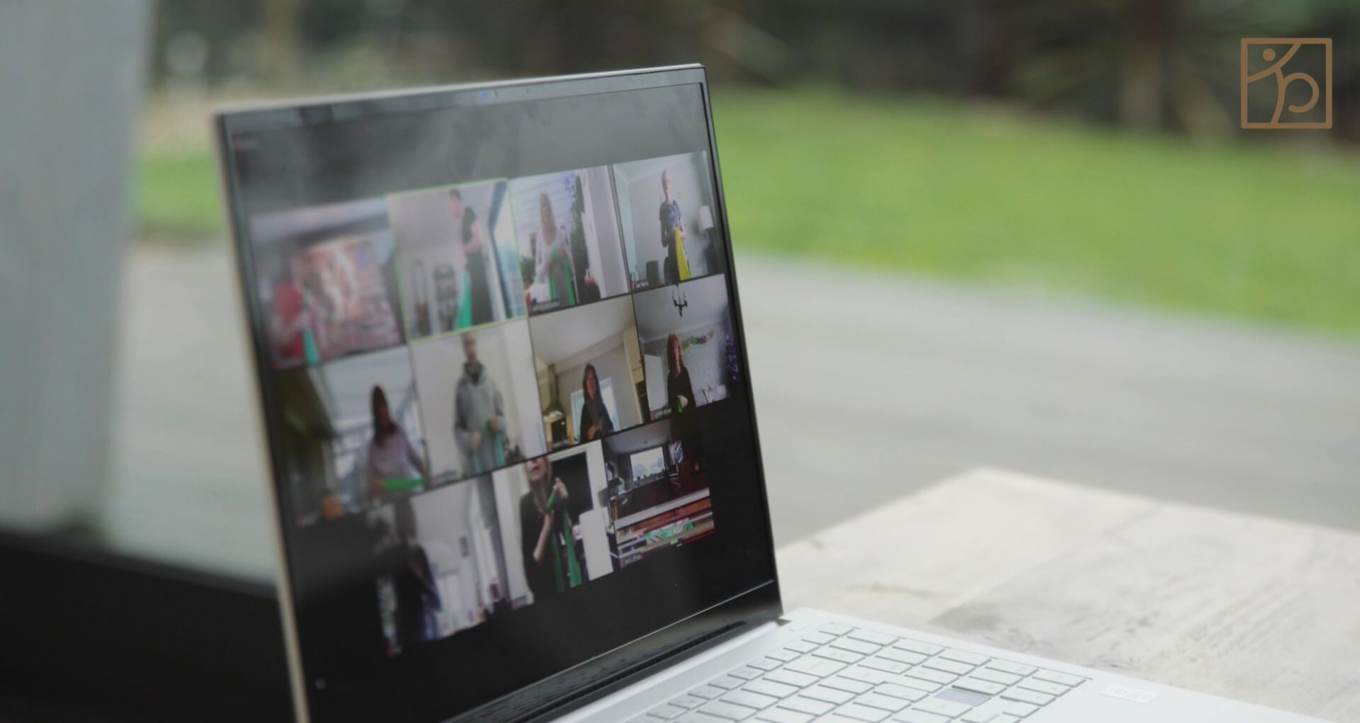 Laptop showing Zoom call for a virtual personal training session